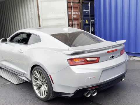 Container unloading Camaro ZL1 _ Mustang Convertible (HQ).jpg